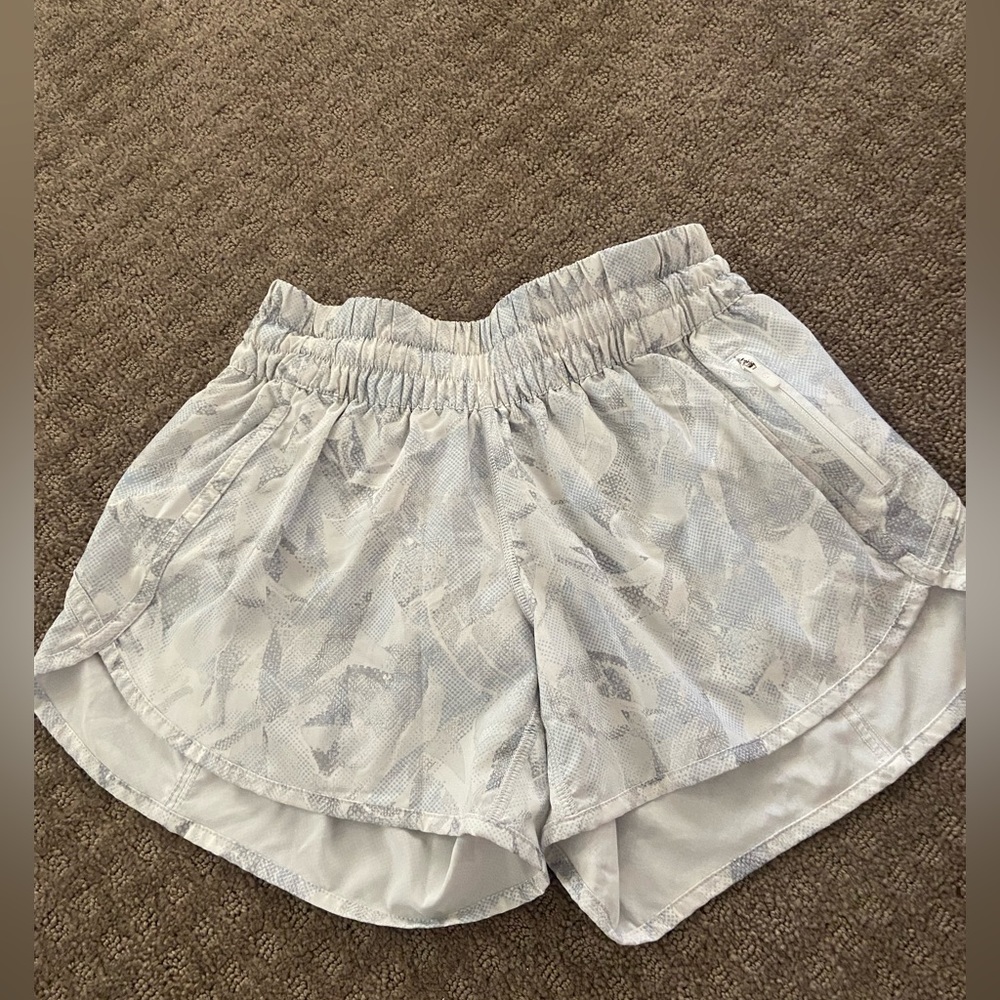 Lululemon track that short. Size 6. White and grey.